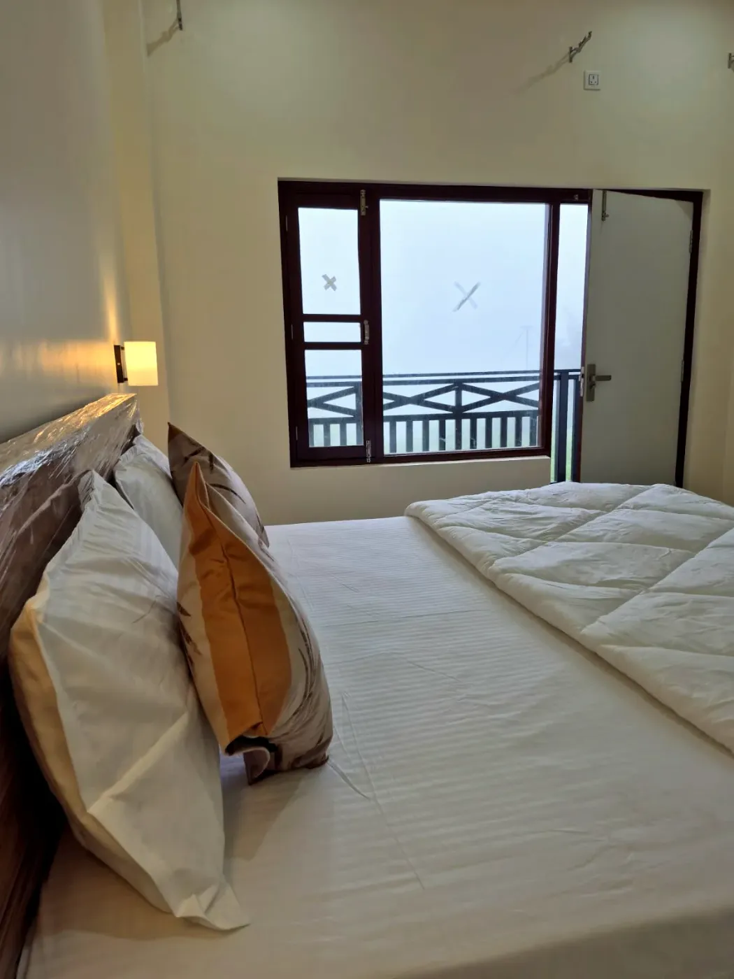 Bed beside the window